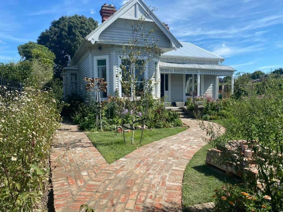 Brick path leading to a villa